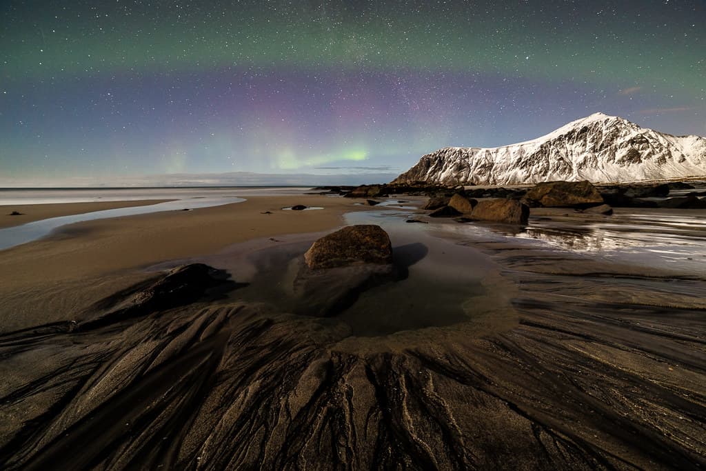 skagsanden beach on night - flackstad norway