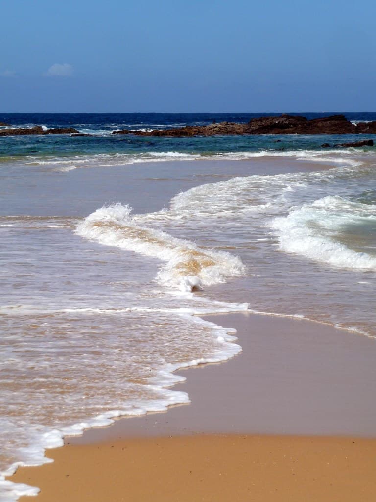 Two waves meet at Mystery Bay, Eurobodalla, New South Wales