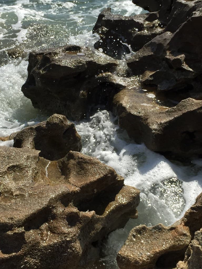 Waves Splashing Rocks