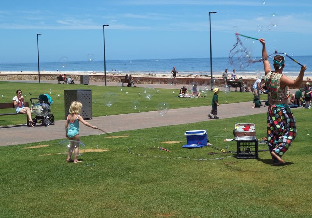 Glenelg Beach. Colourful bubble maker.