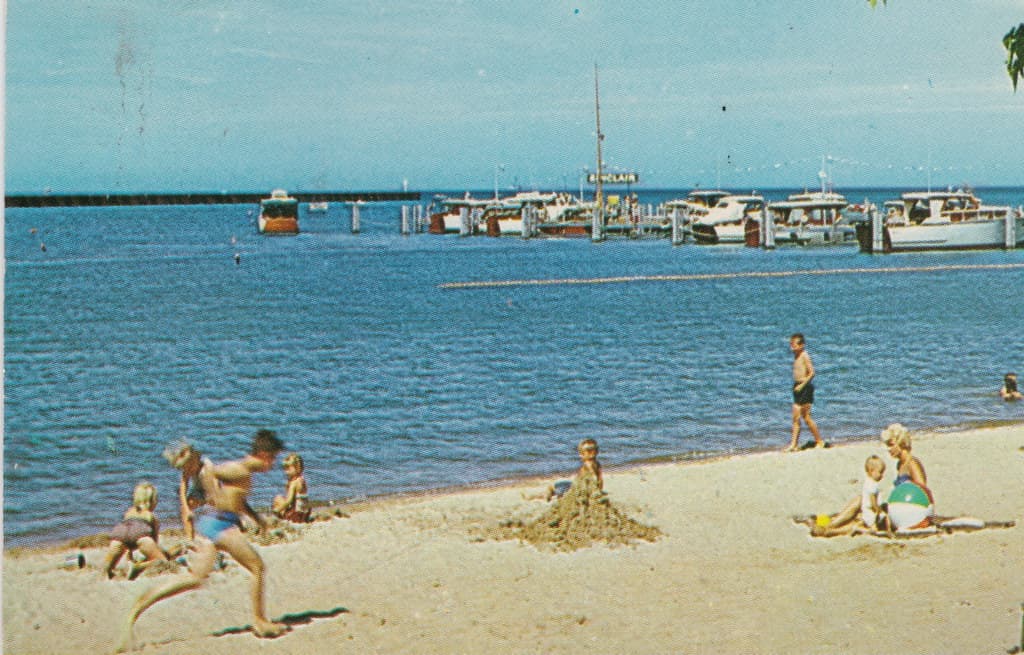 CEN Port Austin MI 1950s SINCLAIR MARINA GAS DOCK BEACH BABES & Vacationing Tourists Port Austin Harbor & Beach Swimming Pier near Port Crescent State Park on Lake Huron Postmarked 19621