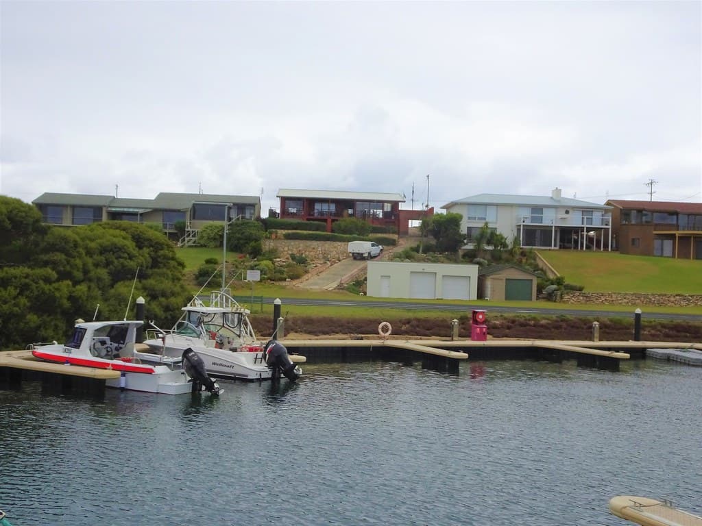 Robe South Australia. Beach houses overlooking Lake Butler named after the fiist Resident Commissioner of Robe. He began there in 1846.