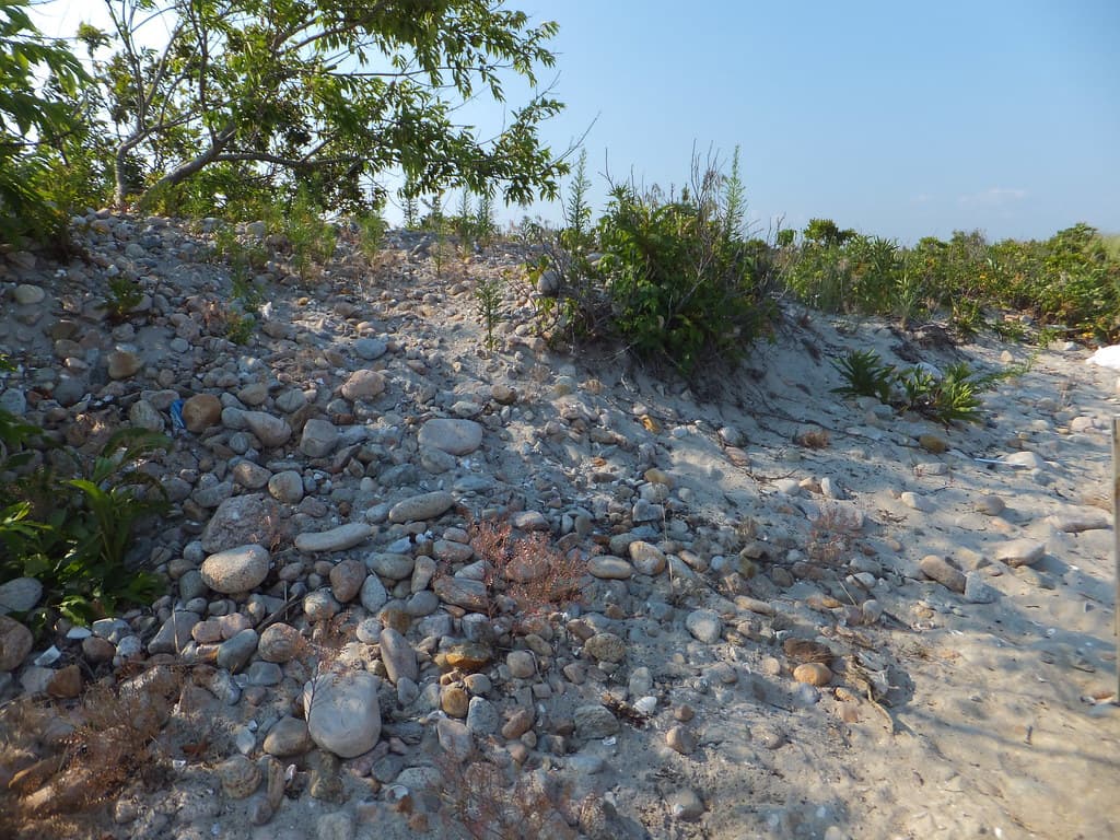 Rocky shoreline above the beach