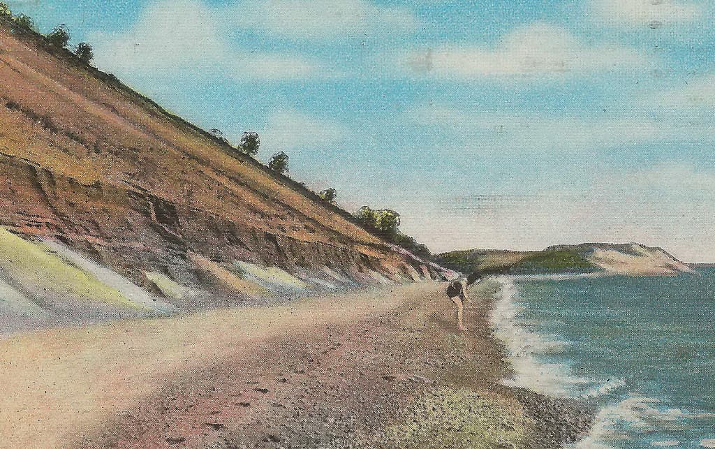 NW Leelanau Glen Haven MI Circa 1920s Young Girl on Beach at Sleeping Bear Dunes Empire Sailors Landmark Empire Bluffs in distance Photographer PECK2