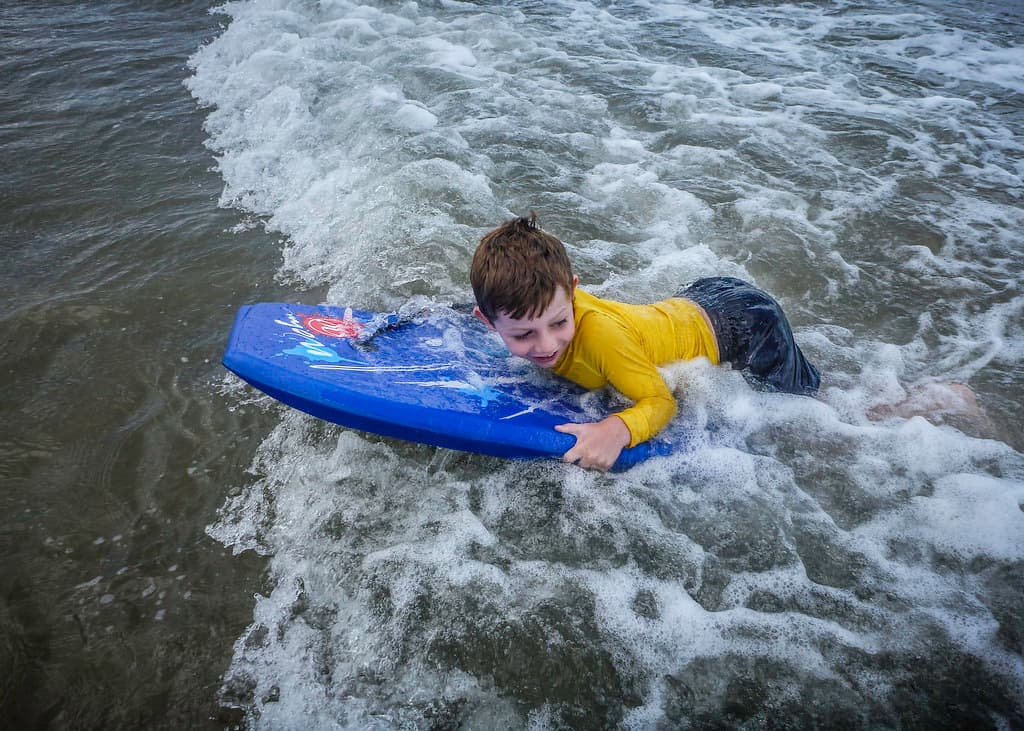 Ezra with body board #4, Seven Mile Beach