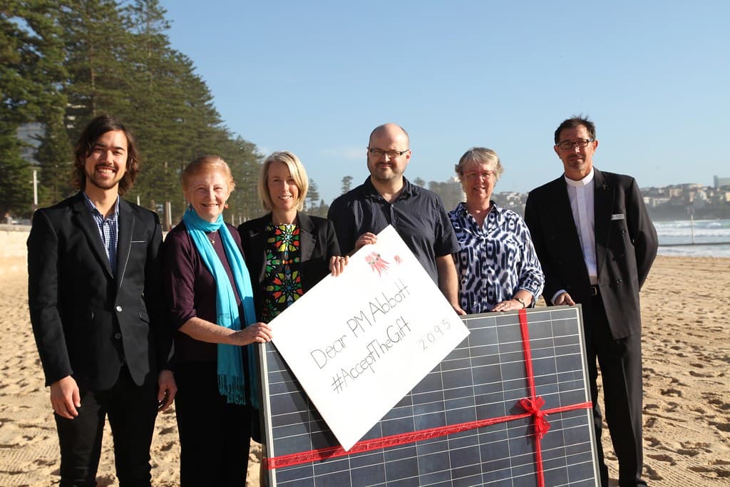 Solar panel gift on Manly beach as Common Grace ask PM Tony Abbott to #acceptthegift of solar for Kirribilli House
